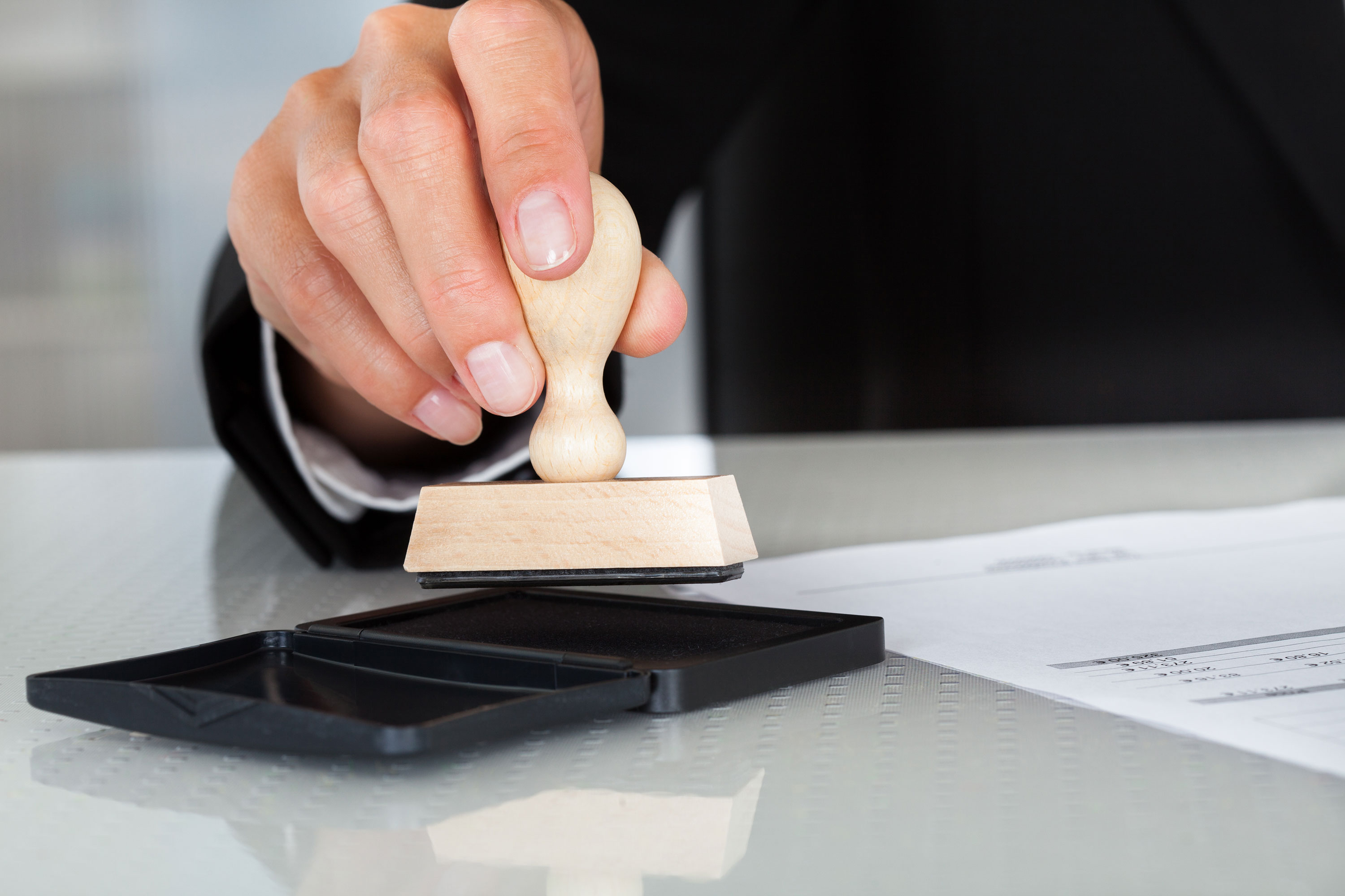 Hand stamping a formation document